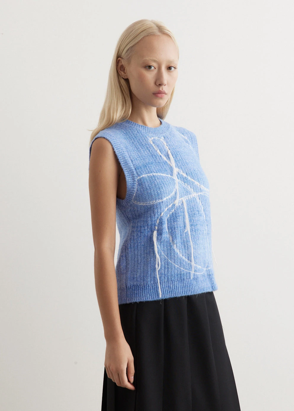 00:28 Knitted Vest 3 00:28 Knitted Vest - Image 3