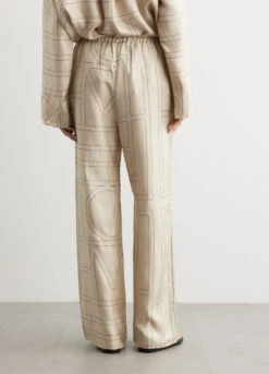 Toteme Monogram Silk Pyjama Bottoms -Style Haven Shop womens incu 499 2434f6b8 1871 494b a174 8fca62a5ee65